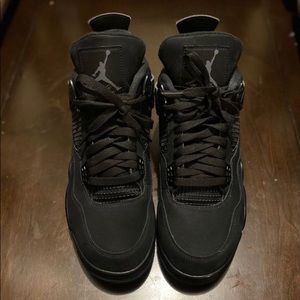 Black cat Jordan 4’s